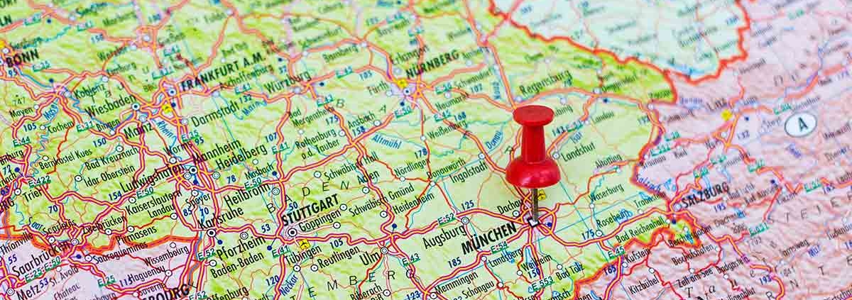 Straßenkarte von Deutschland mit einem roten Pin in München | Immobilienverkauf aus der Ferne
